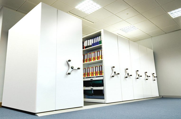 How do mobile shelving systems improve work efficiency?